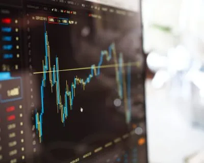 Close-up of a stock market chart on a screen, representing options trading analysis