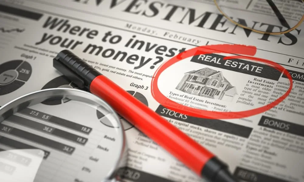 A newspaper with a home advertisement circled by someone considering self-directed IRA real estate options