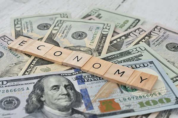 the word economy spelled out in wooden letter tile 2023 11 27 05 08 18 utc | Bogart Wealth