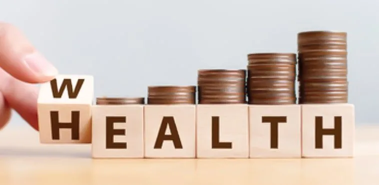 Person flipping blocks that say wealth with coins on them