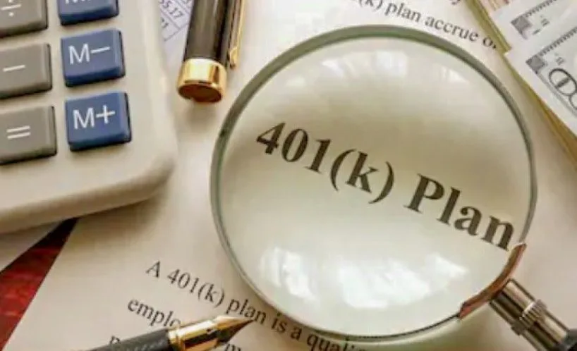 Magnifying glass over a 401(K) plan