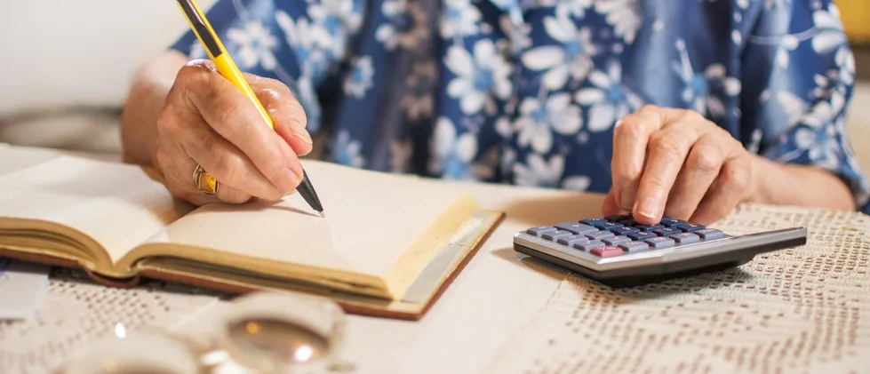 Person researching retirement income needs