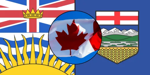 Two provincial flags alongside a central Canadian flag.