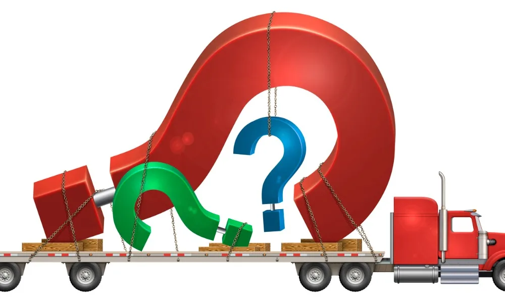 Flatbed or Car Hauler? Our Top 5 Tips to Choose the Right Transport 16 A graphic of a flatbed or car hauler transporting three giant question marks.