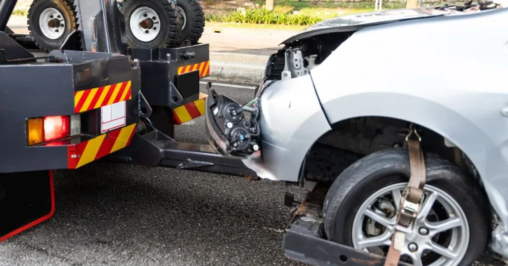 How to get car towed after accident scene documentation