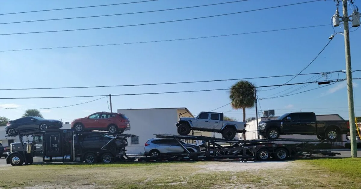 Geyers open car carrier transporting vehicles along the East Coast