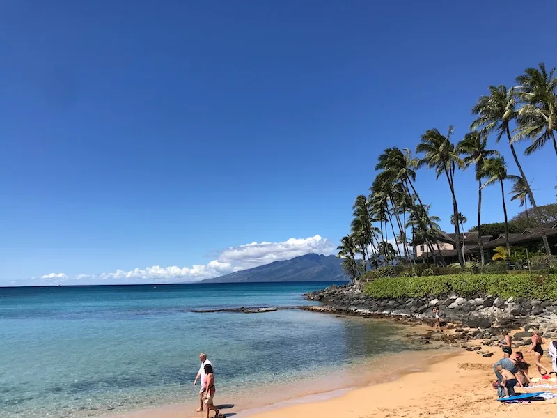 The shores of Napili Bay with the Napili Kai Resort on the right. Puna Point is part of Napili Kai Resort.