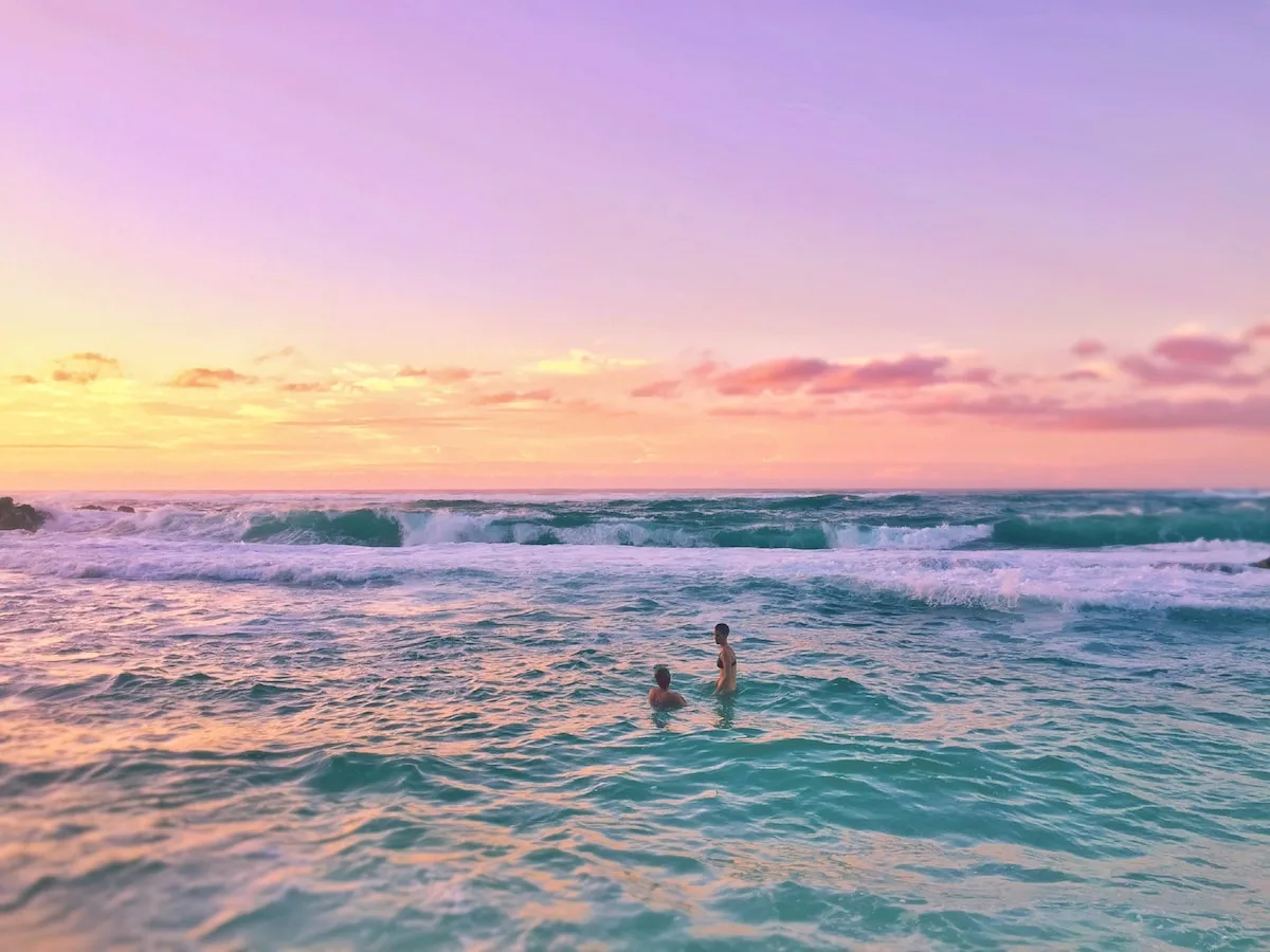 Maui Real Estate Market Update Q1 2024 Vol. 2 1 Pastel skies at sunset at Mama's Beach in Kuau
