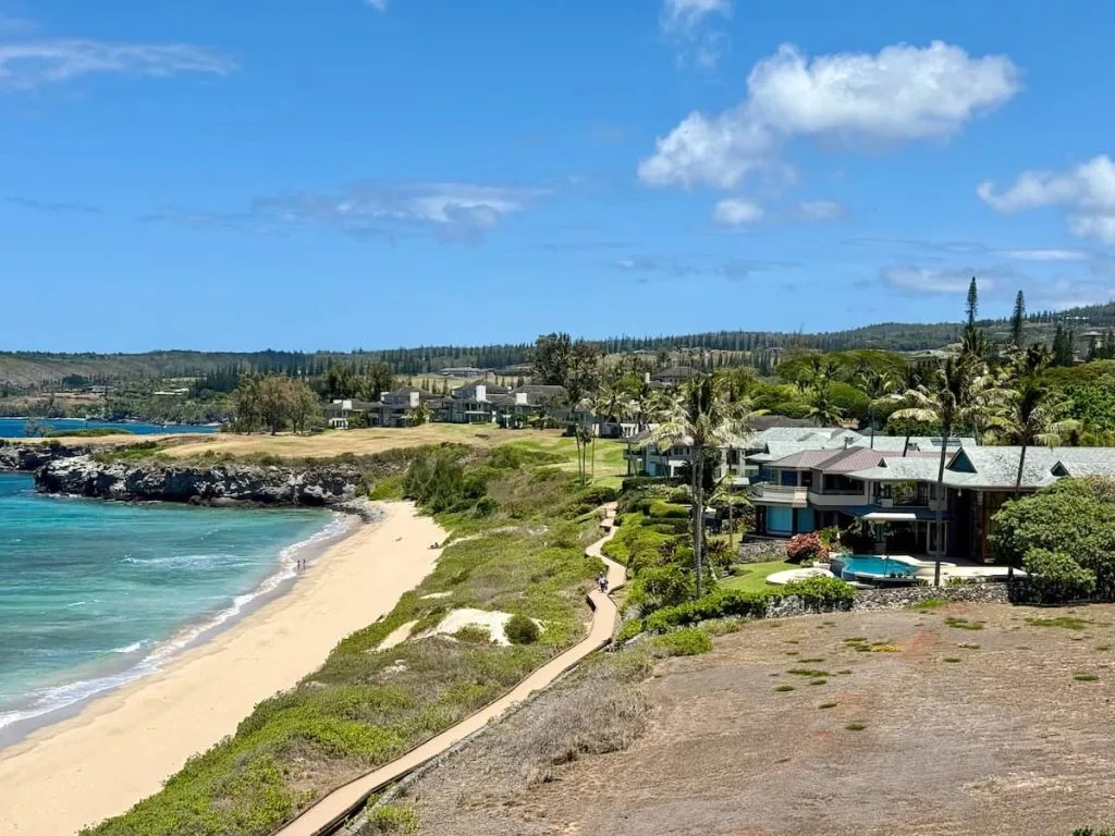 The Ultimate Guide to Purchasing a Maui Oceanfront Home 4 Homes in Kapalua Place are elevated above Oneloa Beach