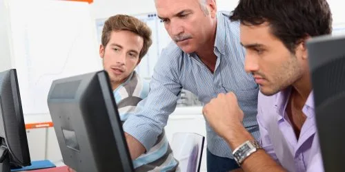 Older students using computers in the classroom