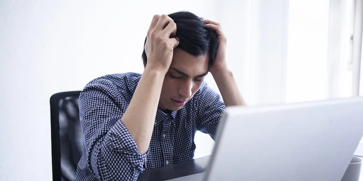 Male employees troubled with their heads