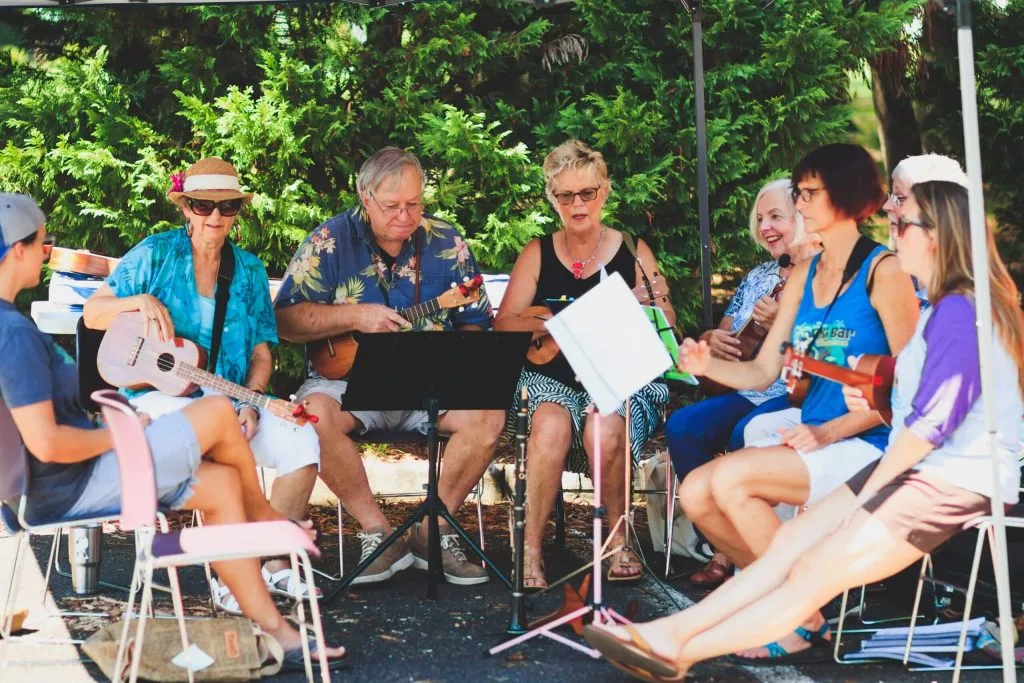 8 Therapeutic Benefits of Music for All Ages 8 mixed age group experiencing benefits of music