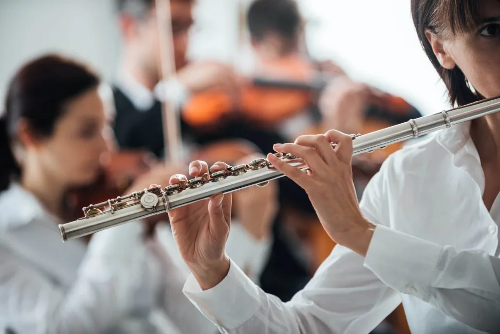 person playing the flute