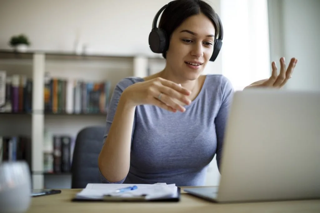 Online Vocal Lessons: The Pros and Cons of Virtual Training 2 woman taking online vocal lessons