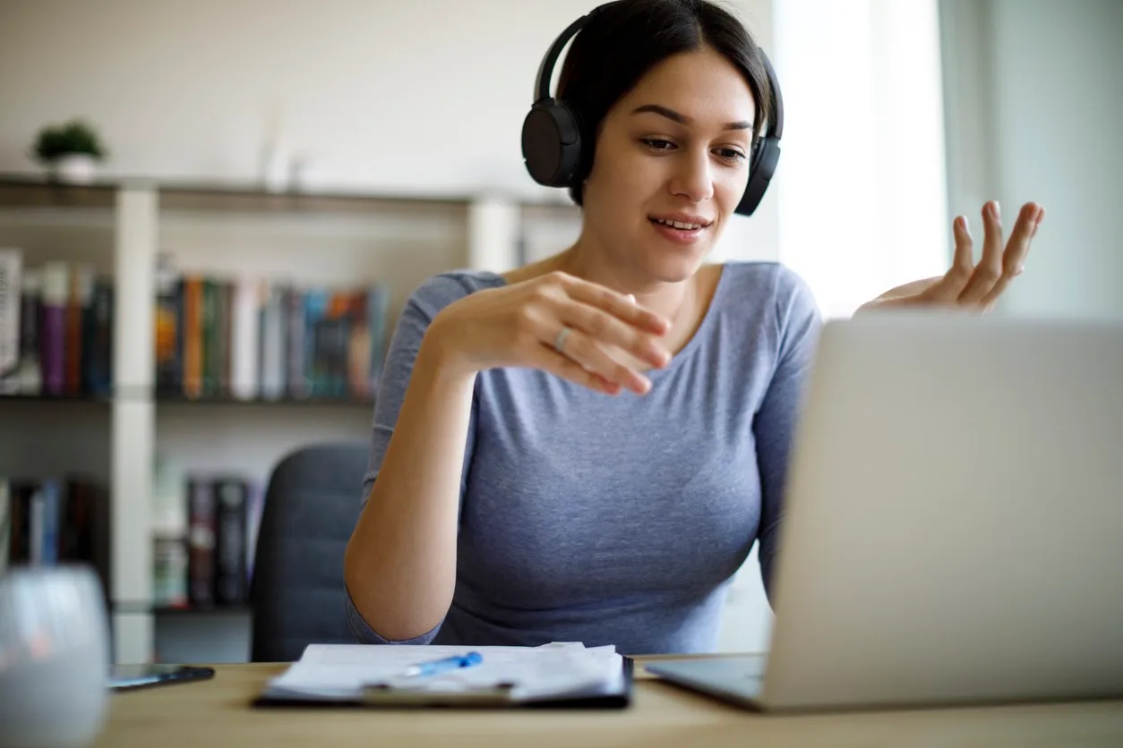 woman taking online vocal lessons
