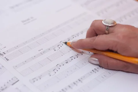 student learning music