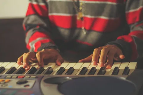 11 Keys to Successful Virtual Music Lessons 1 boy learning piano in virtual music lesson